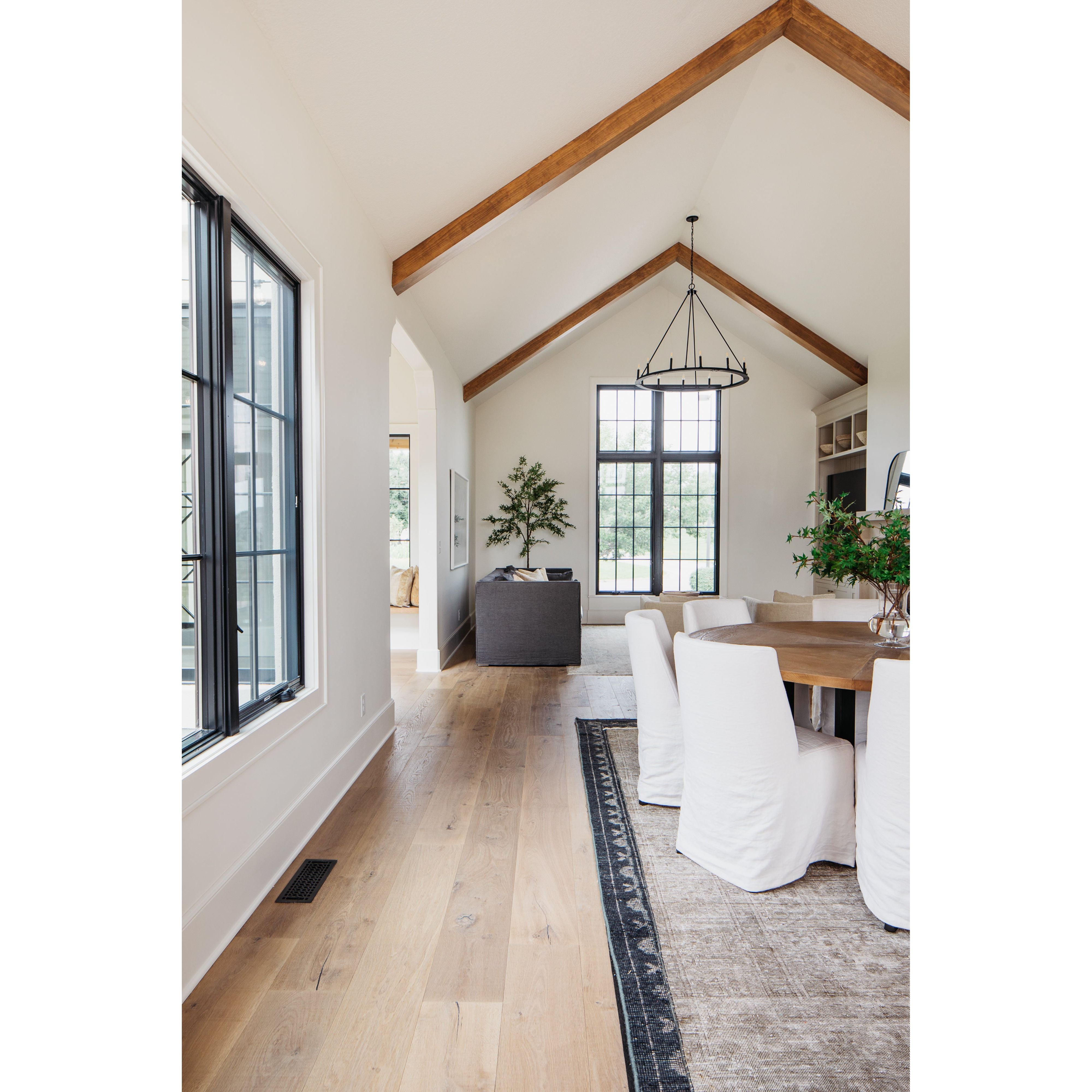 Featuring Craig Dining Chair by Dovetail at Amethyst Home. The Craig Dining Chair is featured in a gorgeous white linen slip cover in a Belgian wrinkle. The chair is comfortable, chic, and easy to care and maintain.

Belgian wrinkle white linen fabric
Birch frame

Size: 19"L x 23"d x 35"hSeat Height: 20"h.  Amethyst Home provides interior design, new home construction design consulting, vintage area rugs, and lighting in the Salt Lake City metro area.