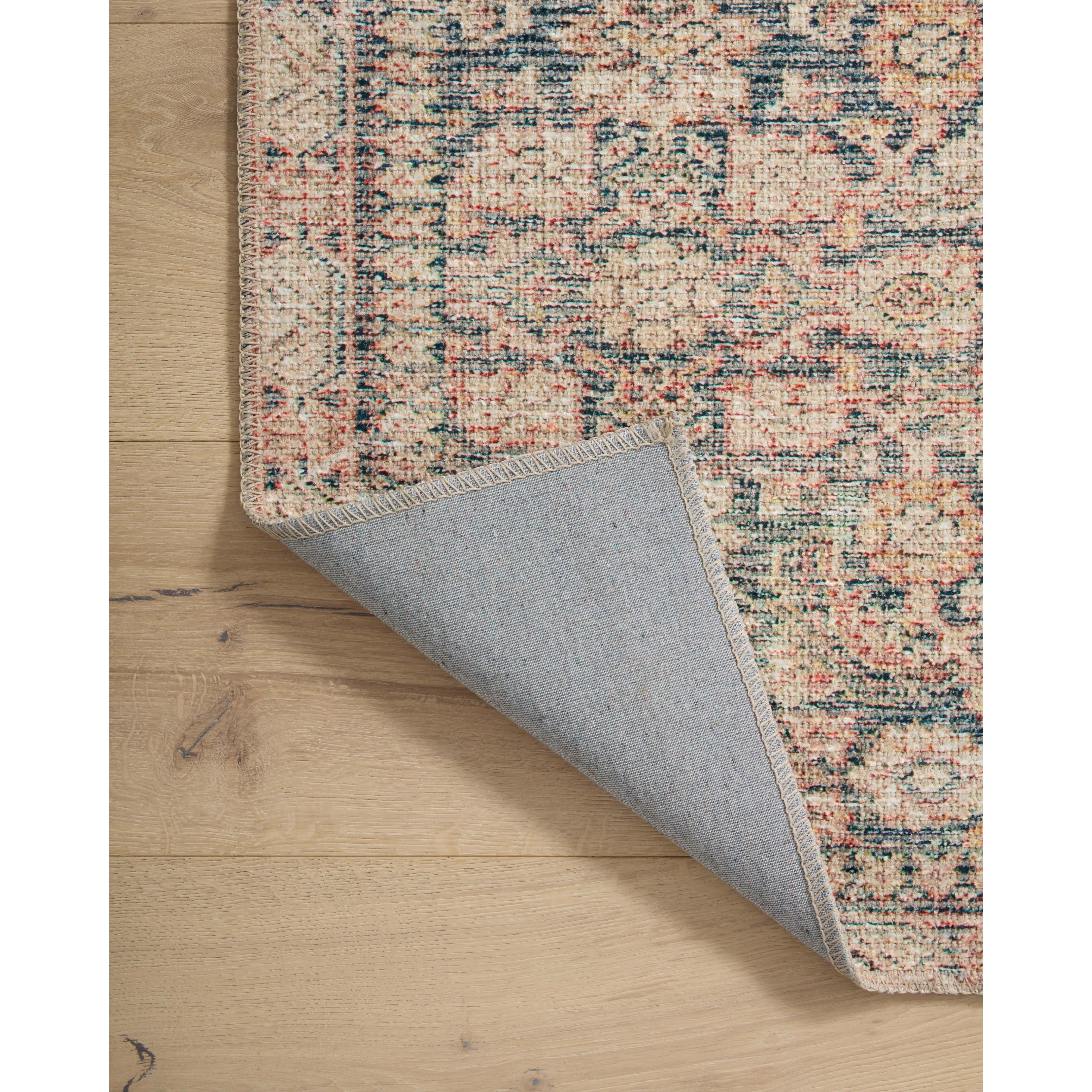 The Angela Rose x Loloi Aubrey Navy / Multi rug is the vintage-inspired area rug that makes visitors do double takes. The distressed pattern is printed with uncanny precision, while the ombre-fading and warm palette create an inviting, lived-in look. Amethyst favorite! Amethyst Home provides interior design services, furniture, rugs, and lighting in the Dallas metro area.