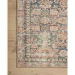 The Angela Rose x Loloi Aubrey Navy / Multi rug is the vintage-inspired area rug that makes visitors do double takes. The distressed pattern is printed with uncanny precision, while the ombre-fading and warm palette create an inviting, lived-in look. Amethyst favorite! Amethyst Home provides interior design services, furniture, rugs, and lighting in the Tampa metro area.