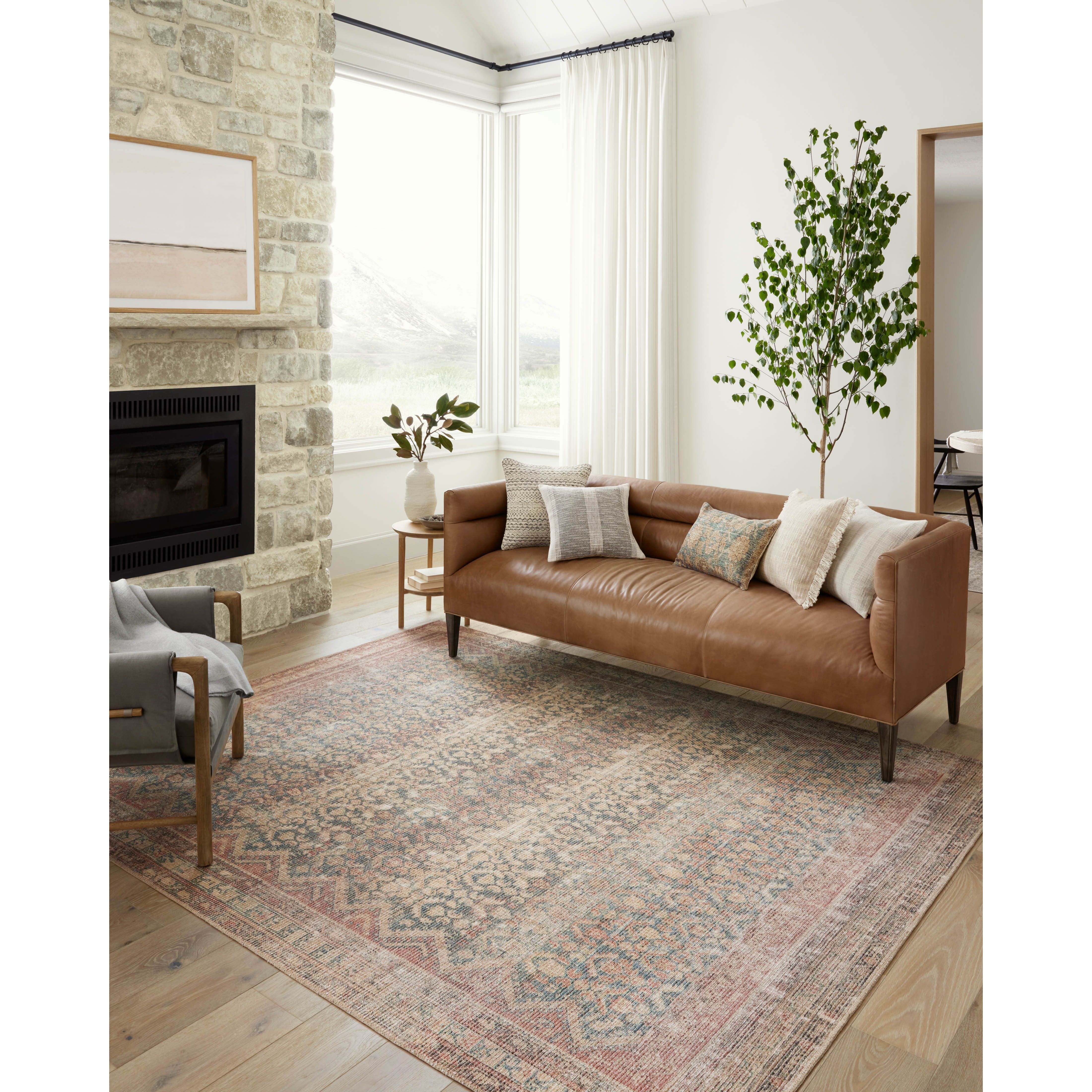 The Angela Rose x Loloi Aubrey AUB-03 Ocean / Spice rug is the vintage-inspired area rug that makes visitors do double takes. The distressed pattern is printed with uncanny precision, while the ombre-fading and warm palette create an inviting, lived-in look. Amethyst favorite! Amethyst Home provides interior design services, furniture, rugs, and lighting in the Omaha metro area.