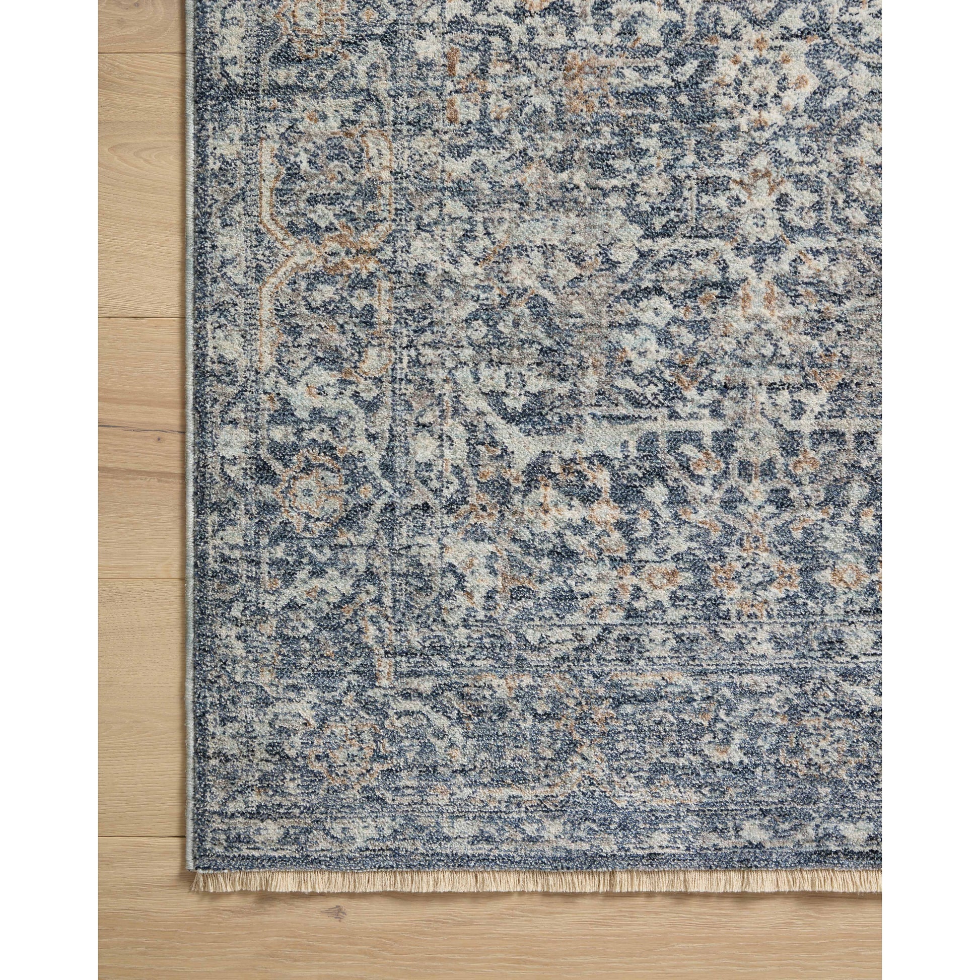 The Angela Rose x Loloi Blake BLA-03 Denim / Taupe rug features traditional motifs that have softened into the background, making it an effortless neutral in any room. Muted earth-toned palettes complement a range of furniture, while subtle cream-colored fringe at the edges add texture and framing. Amethyst favorite! Amethyst Home provides interior design services, furniture, rugs, and lighting in the Alpharetta metro area.