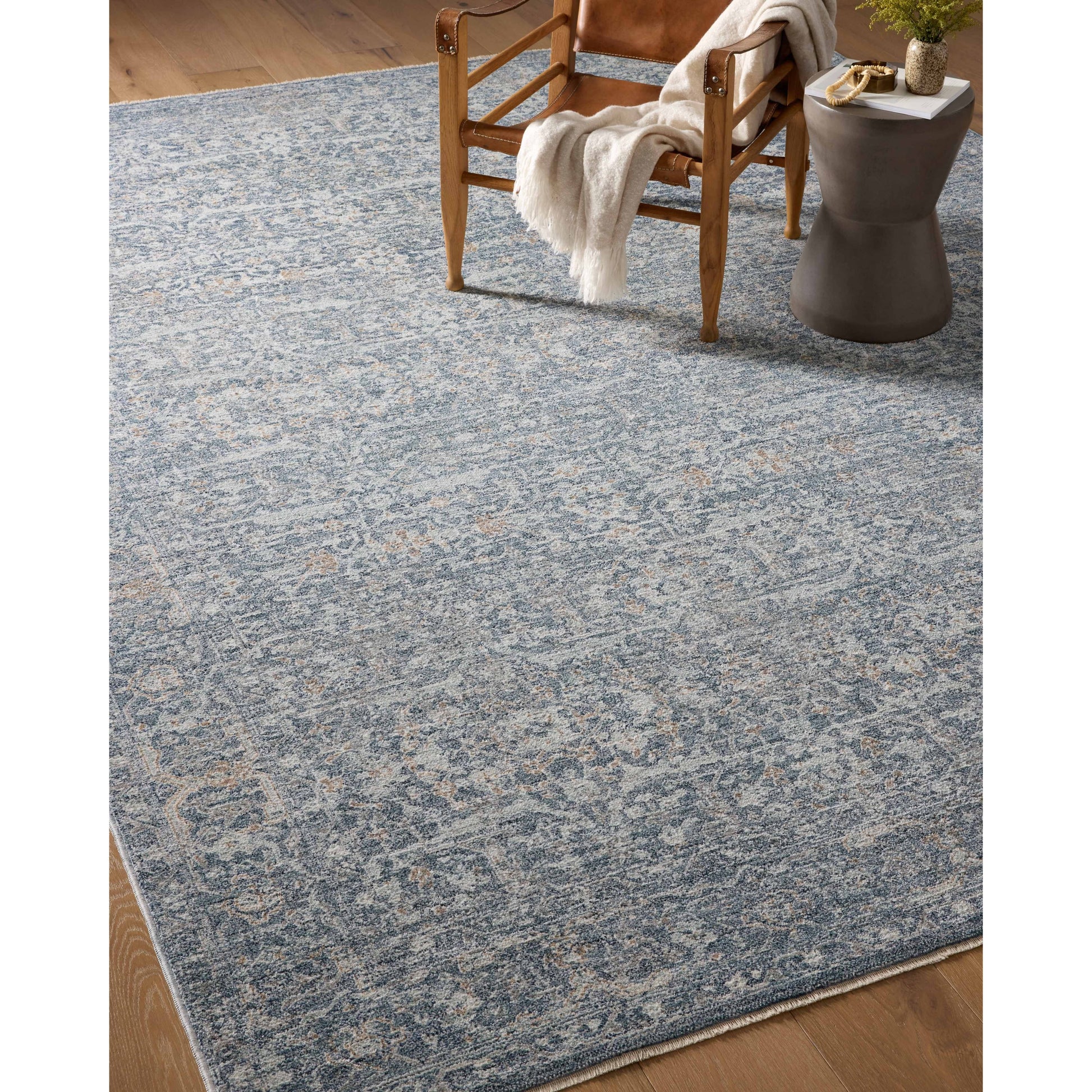 The Angela Rose x Loloi Blake BLA-03 Denim / Taupe rug features traditional motifs that have softened into the background, making it an effortless neutral in any room. Muted earth-toned palettes complement a range of furniture, while subtle cream-colored fringe at the edges add texture and framing. Amethyst favorite! Amethyst Home provides interior design services, furniture, rugs, and lighting in the Scottsdale metro area.