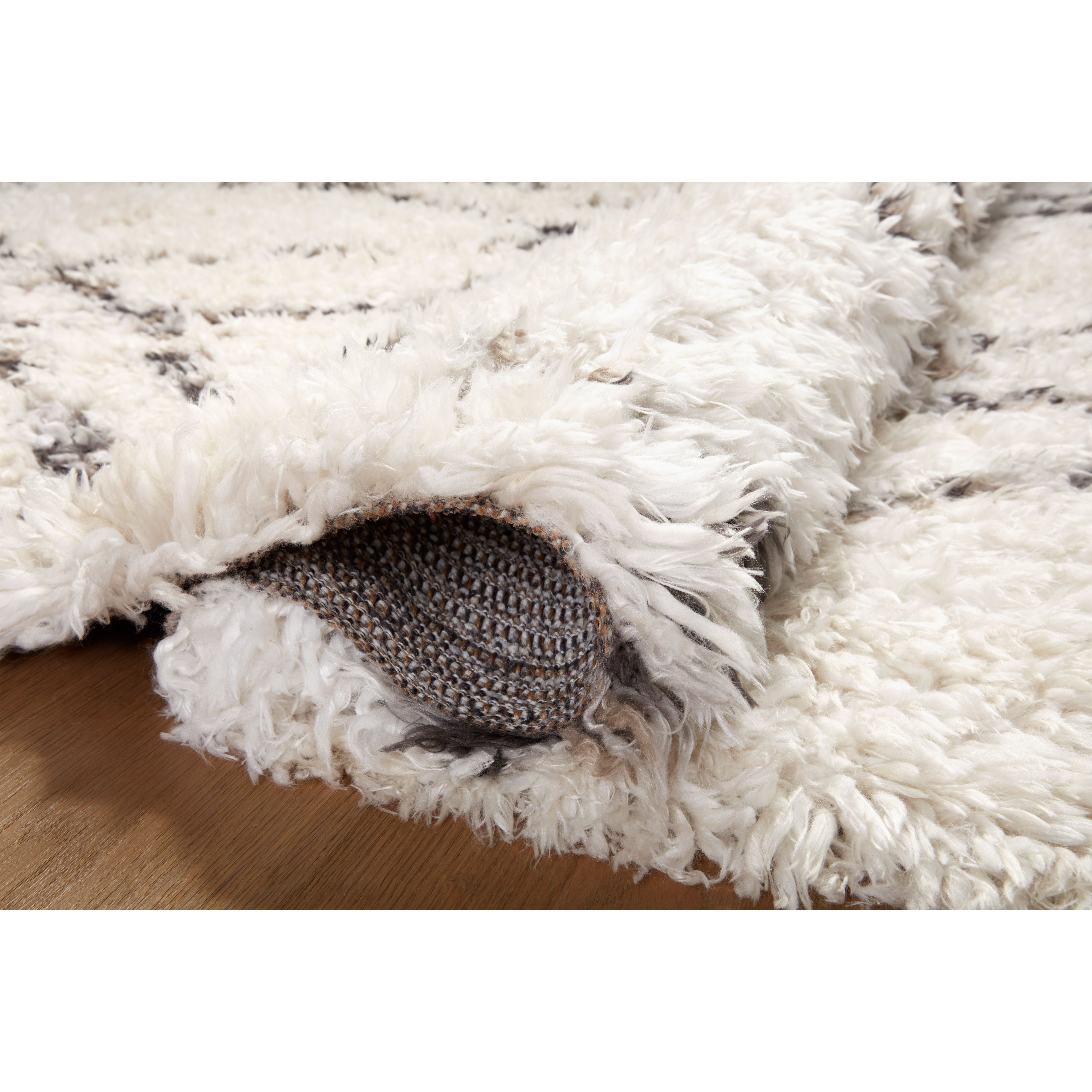 Featuring Angela Rose x Loloi Amira Ivory / Bark Rug by Loloi at Amethyst Home. The extra-plush and inviting Amira Ivory / Bark rug by Angela Rose x Loloi is a Moroccan-inspired area rug with modern geometric patterns (like checkerboard and windowpane) in home-friendly neutral palettes. The rug is power-loomed of 100% polyester and designed to have a soft, high pile that never she. Amethyst Home provides interior design, new construction, custom furniture, and area rugs in the Monterey metro area.