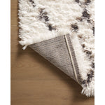 Featuring Angela Rose x Loloi Amira Ivory / Bark Rug by Loloi at Amethyst Home. The extra-plush and inviting Amira Ivory / Bark rug by Angela Rose x Loloi is a Moroccan-inspired area rug with modern geometric patterns (like checkerboard and windowpane) in home-friendly neutral palettes. The rug is power-loomed of 100% polyester and designed to have a soft, high pile that neve. Amethyst Home provides interior design, new construction, custom furniture, and area rugs in the Winter Garden metro area.