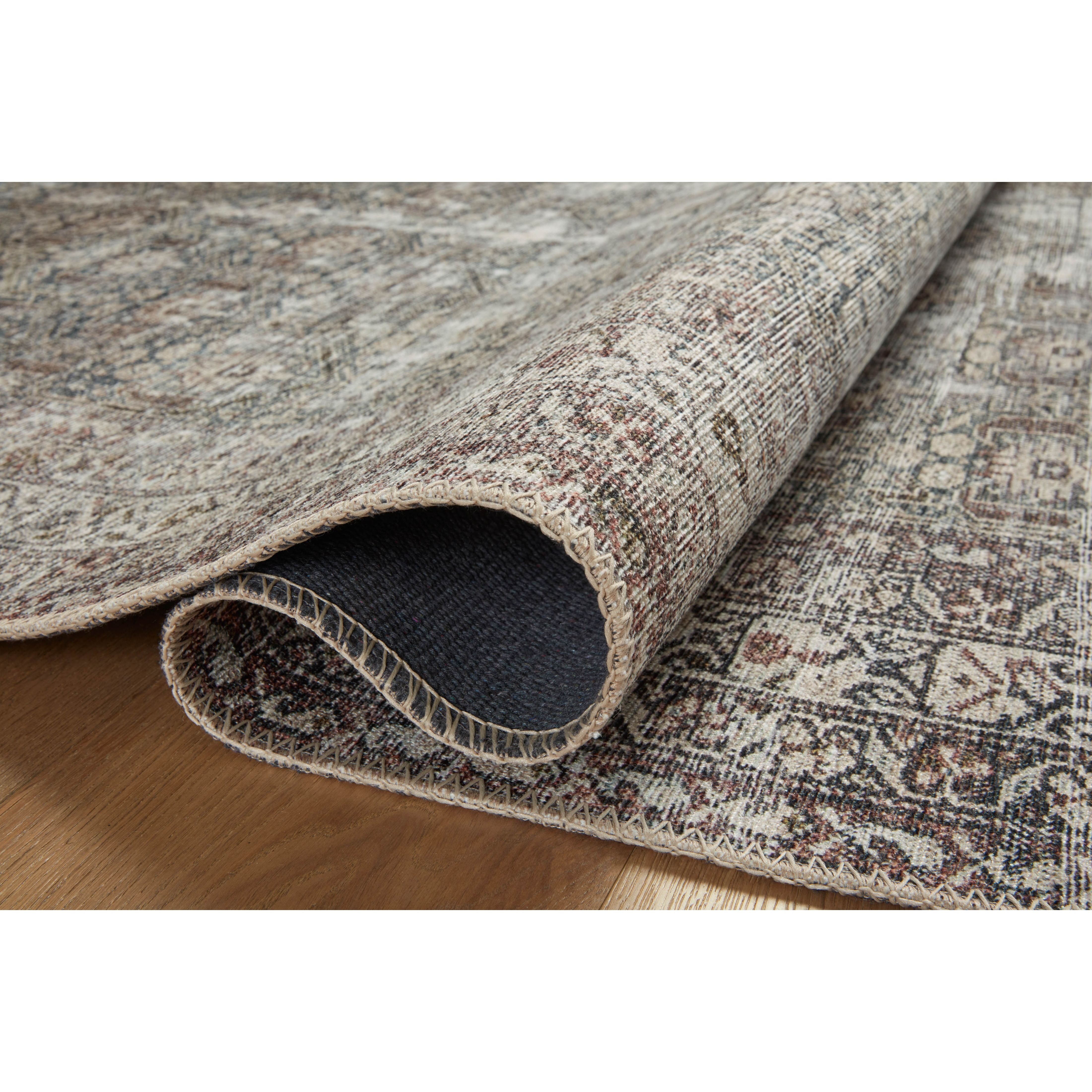 Featuring Amber Lewis x Loloi Georgie Moss / Bark Rug by Loloi at Amethyst Home. Inspired by interior designer Amber Lewis' penchant for vintage rugs, the Georgie Moss / Bark rug features a printed construction with incredible durability, color saturation, and no shedding. The rug's low, flat pile is designed for easy vacuuming and feels smooth underfoot. Georgie also carries the Oe. Amethyst Home provides interior design, new construction, custom furniture, and area rugs in the Boston metro area.