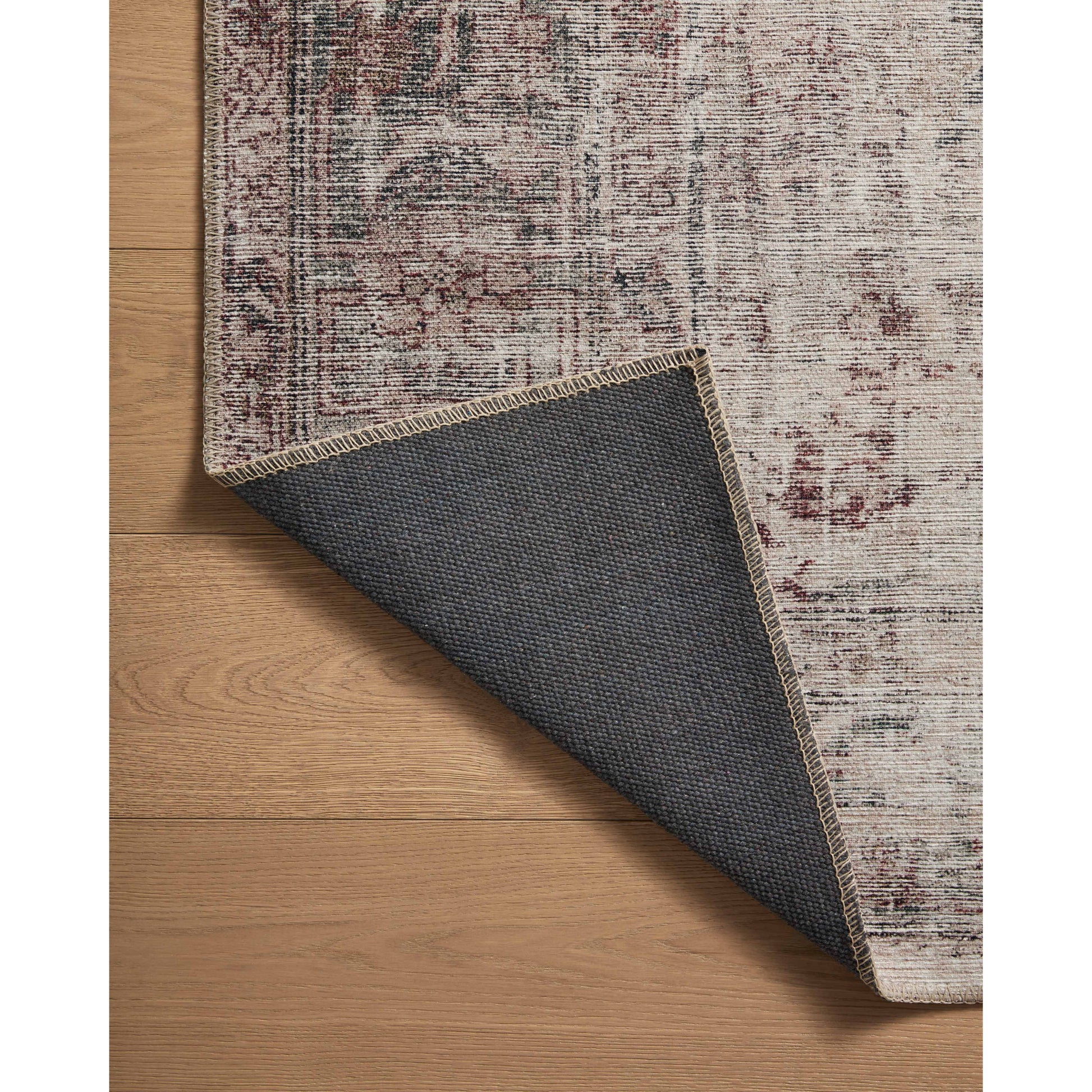 Inspired by interior designer Amber Lewis' penchant for vintage rugs, the Georgie Collection features a printed construction with incredible durability, color saturation, and no shedding. The rug's low, flat pile is designed for easy vacuuming and feels smooth underfoot. Georgie also carries the Oeko-TexÂ® label, ensuring the rug's materials do not contain harmful substances. Amethyst Home provides interior design, new construction, custom furniture, and area rugs in the Austin metro area.