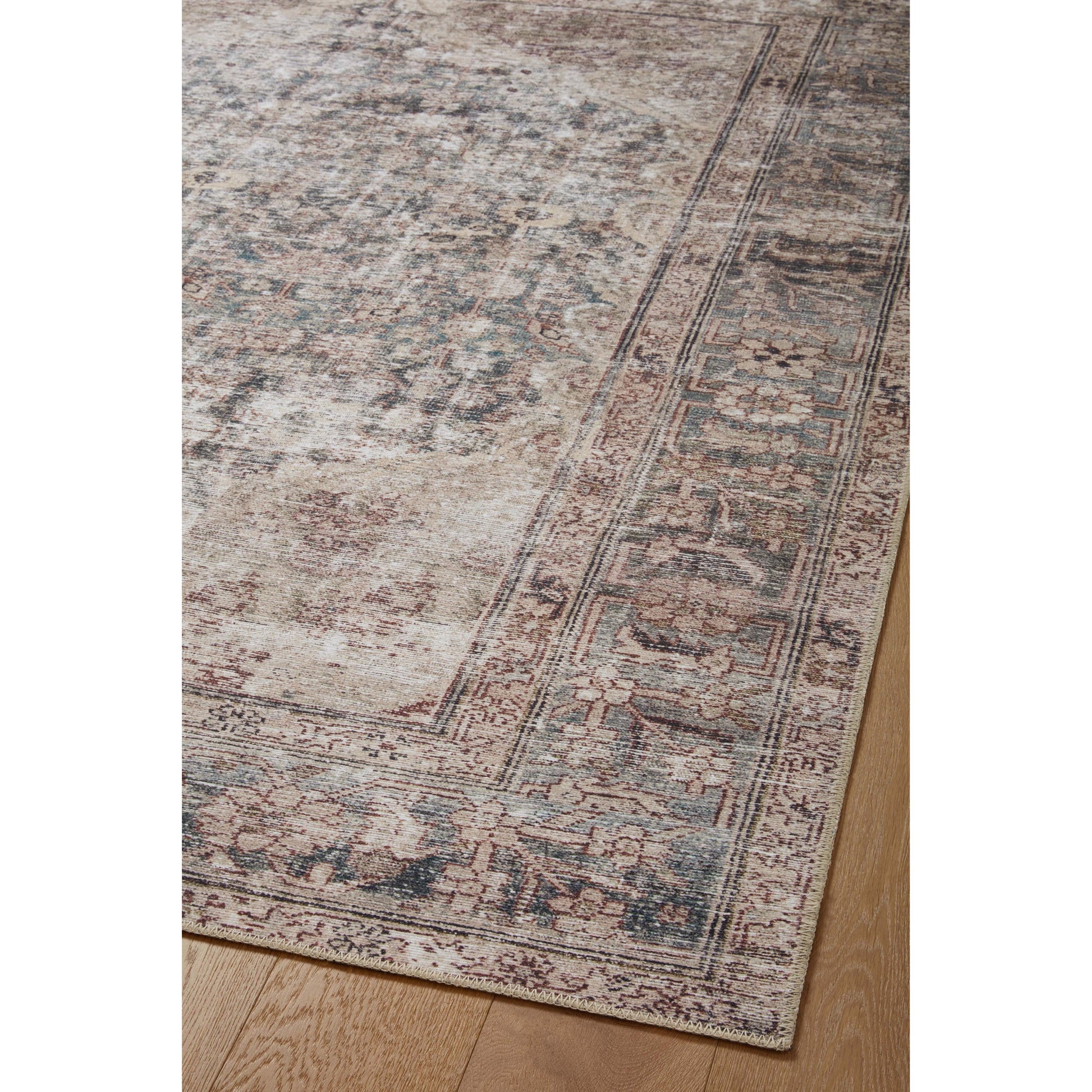 Inspired by interior designer Amber Lewis' penchant for vintage rugs, the Georgie Collection features a printed construction with incredible durability, color saturation, and no shedding. The rug's low, flat pile is designed for easy vacuuming and feels smooth underfoot. Georgie also carries the Oeko-TexÂ® label, ensuring the rug's materials do not contain harmful substances. Amethyst Home provides interior design, new construction, custom furniture, and area rugs in the Portland metro area.