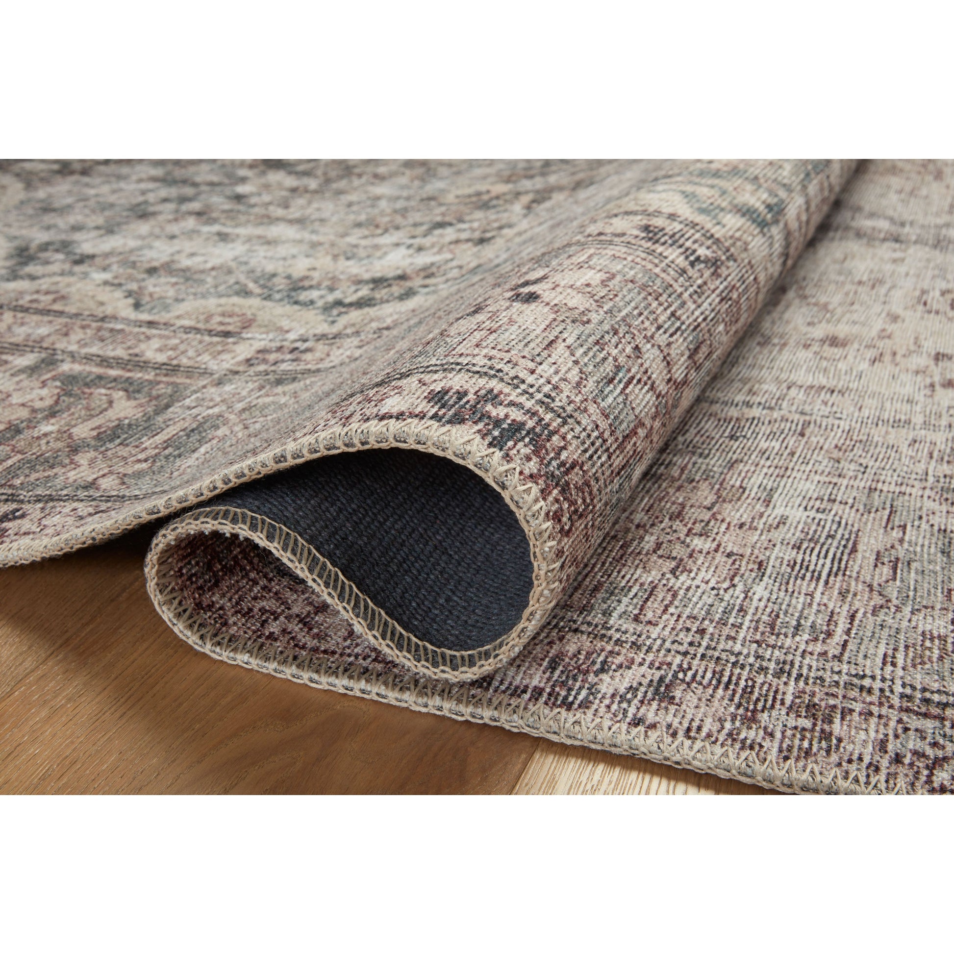 Inspired by interior designer Amber Lewis' penchant for vintage rugs, the Georgie Collection features a printed construction with incredible durability, color saturation, and no shedding. The rug's low, flat pile is designed for easy vacuuming and feels smooth underfoot. Georgie also carries the Oeko-TexÂ® label, ensuring the rug's materials do not contain harmful substances. Amethyst Home provides interior design, new construction, custom furniture, and area rugs in the Scottsdale metro area.