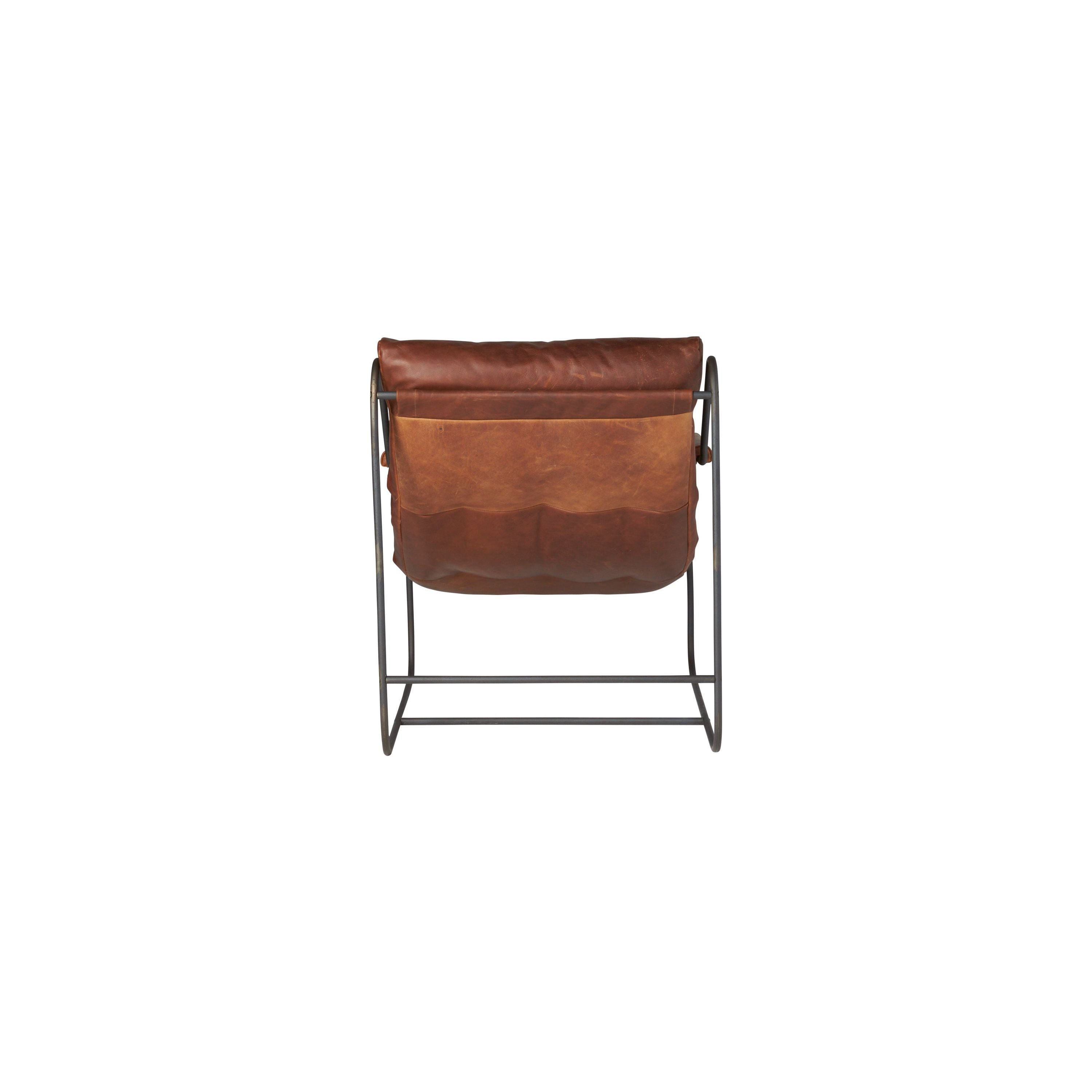 Like "sitting in an American baseball glove" -- the Brando Leather Chair from Cisco Brothers was love at first sit in this unique chair! We compare the feel to sitting in a hammock. As shown in Spur Terracotta leather.  Size: 27"w x 36"d x 32"h  Seat space: 25"w x 19"d x 17.5"h