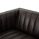 Featuring Henry Wolf Leather Sofa 97" by Four Hands at Amethyst Home. Upholstered in dreamy "wolf" leather -- this sofa is the perfect blend of chocolate and grey tones.  Channeled leather makes for a structured, comfortable sit.  
The Amethyst design team often recommends this sofa when you need a narrower depth without sacrificing comfort.  This sofa seats c.  Amethyst Home provides interior design, new home construction design consulting, vintage area rugs, and lighting in the Omaha metro area.