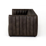 Featuring Henry Wolf Leather Sofa 97" by Four Hands at Amethyst Home. Upholstered in dreamy "wolf" leather -- this sofa is the perfect blend of chocolate and grey tones.  Channeled leather makes for a structured, comfortable sit.  
The Amethyst design team often recommends this sofa when you need a narrower depth without sacrificing comfort.  This sofa seat.  Amethyst Home provides interior design, new home construction design consulting, vintage area rugs, and lighting in the Portland metro area.
