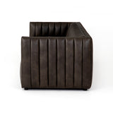 Featuring Henry Wolf Leather Sofa 97" by Four Hands at Amethyst Home. Upholstered in dreamy "wolf" leather -- this sofa is the perfect blend of chocolate and grey tones.  Channeled leather makes for a structured, comfortable sit.  
The Amethyst design team often recommends this sofa when you need a narrower depth without sacrificing comfort.  This sofa seat.  Amethyst Home provides interior design, new home construction design consulting, vintage area rugs, and lighting in the Portland metro area.