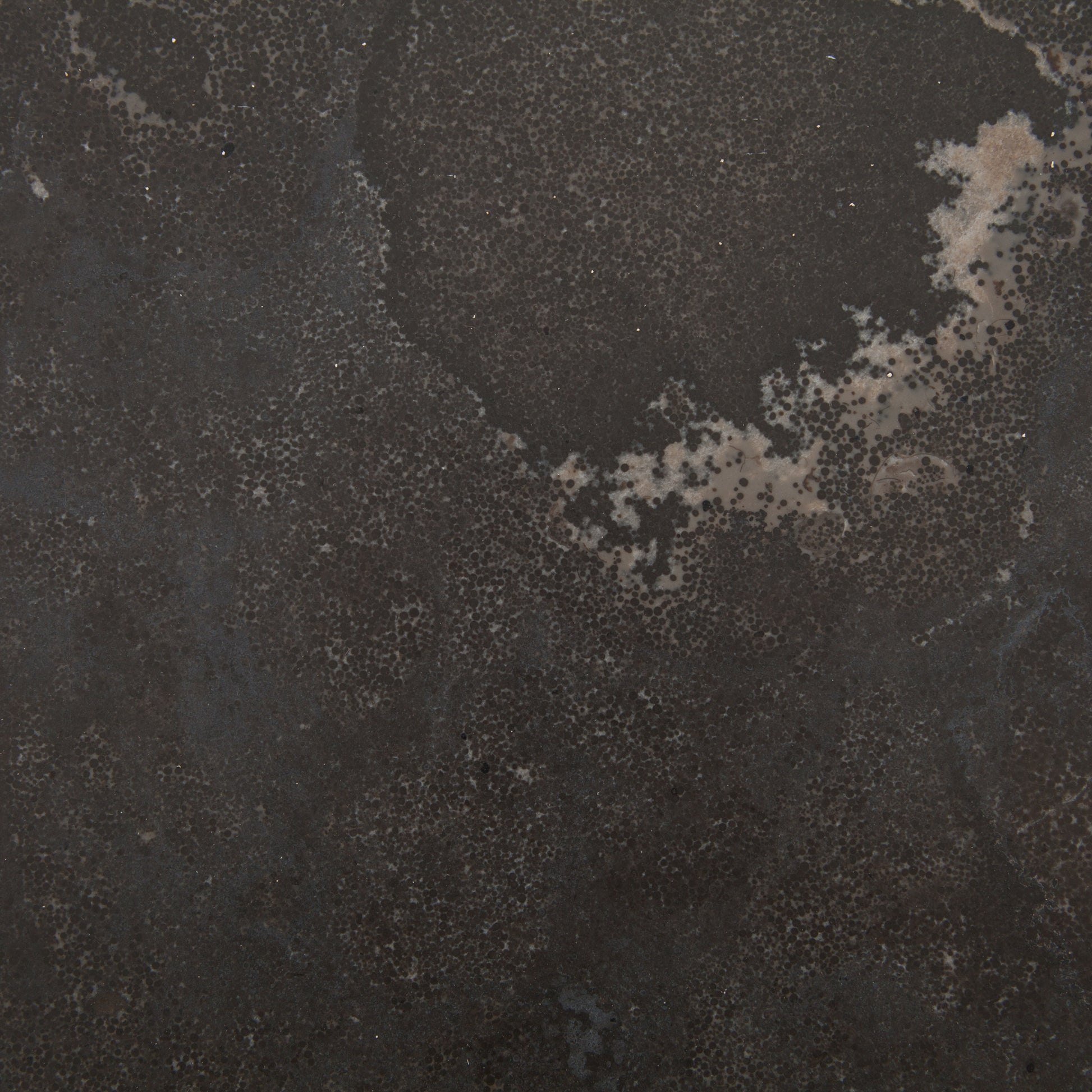 Spare beauty, casual elegance with the Harlow Bluestone Small Coffee Table. A gunmetal Parson's base with hand-rubbed, dimensional edges supports a rough-hewn bluestone slab that feels found and perfectly placed.  Size: 60"w x 28"d x 17"h Materials: Iron, Limestone