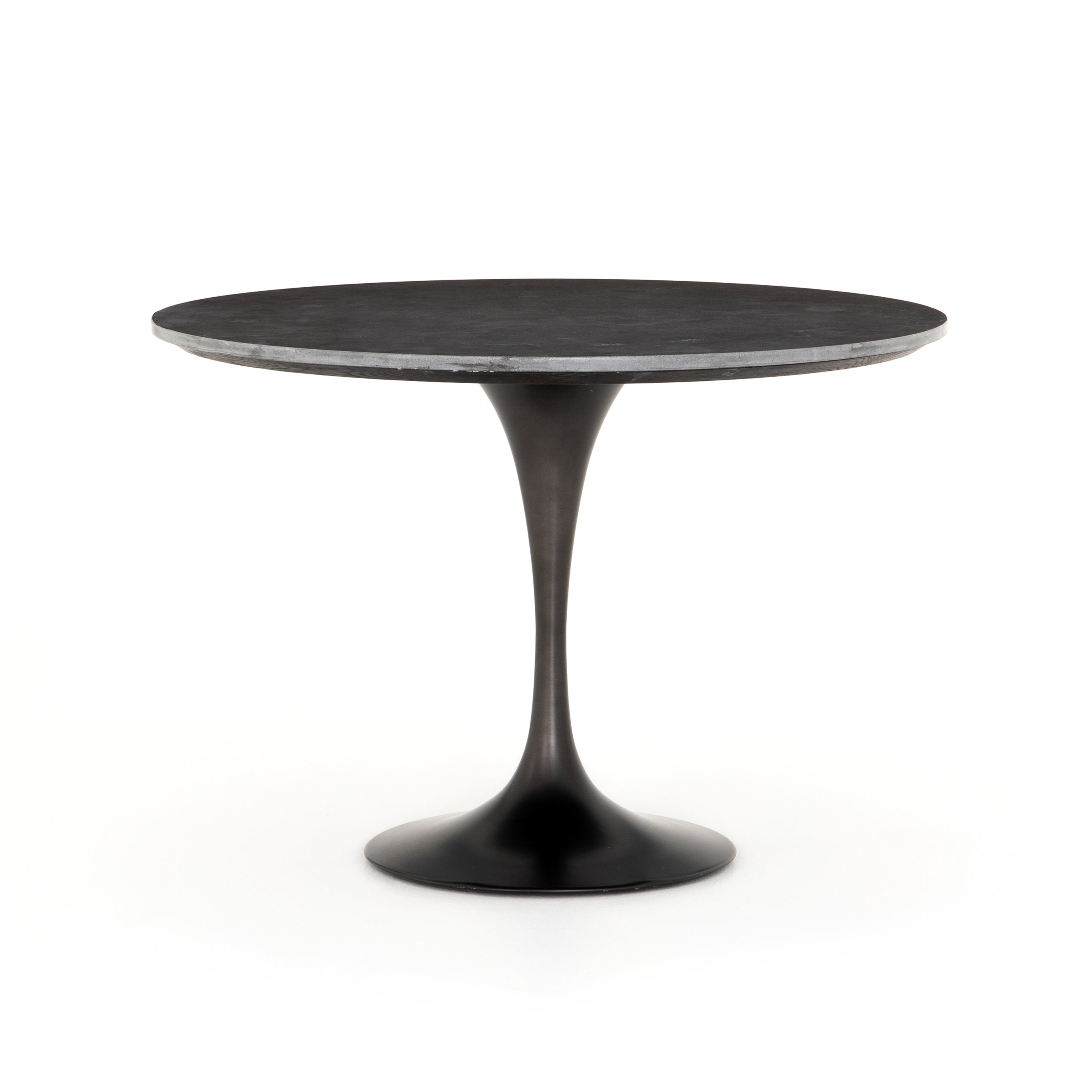 Featuring Powell 55" Dining Table - Bluestone by Four Hands at Amethyst Home. Classic tulip shaping is recast with a rustic black iron finish topped with a solid bluestone table top. This cute bistro style dining table is perfectly sized for a cozy breakfast nook.
Overall Dimensions: 55"W x 55"L x 29.50"H
Colors: Dark Rustic Black, Ebony, BluestoneMateri.  Amethyst Home provides interior design, new home construction design consulting, vintage area rugs, and lighting in the Kansas City metro area.