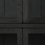 Featuring Spencer Curio Cabinet - Drifted Black by Four Hands at Amethyst Home. We love how the Spencer Drifted Black Curio Cabinet is perched on a simple, waxed black iron pedestal. The rustic black-finished oak forms an airy curio cabinet designed to showcase life’s artifacts.

Overall Dimensions: 45.75"W x 16"L x 69"H
Colors: Drifted Matte Black Veneer, .  Amethyst Home provides interior design, new home construction design consulting, vintage area rugs, and lighting in the Monterey metro area.