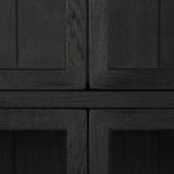 Featuring Spencer Curio Cabinet - Drifted Black by Four Hands at Amethyst Home. We love how the Spencer Drifted Black Curio Cabinet is perched on a simple, waxed black iron pedestal. The rustic black-finished oak forms an airy curio cabinet designed to showcase life’s artifacts.

Overall Dimensions: 45.75"W x 16"L x 69"H
Colors: Drifted Matte Black Veneer, .  Amethyst Home provides interior design, new home construction design consulting, vintage area rugs, and lighting in the Monterey metro area.