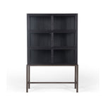 Featuring Spencer Curio Cabinet - Drifted Black by Four Hands at Amethyst Home. We love how the Spencer Drifted Black Curio Cabinet is perched on a simple, waxed black iron pedestal. The rustic black-finished oak forms an airy curio cabinet designed to showcase life’s artifacts.

Overall Dimensions: 45.75"W x 16"L x 69"H
Colors: Drifted Matte Black Veneer, Wax.  Amethyst Home provides interior design, new home construction design consulting, vintage area rugs, and lighting in the Omaha metro area.