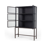 Featuring Spencer Curio Cabinet - Drifted Black by Four Hands at Amethyst Home. We love how the Spencer Drifted Black Curio Cabinet is perched on a simple, waxed black iron pedestal. The rustic black-finished oak forms an airy curio cabinet designed to showcase life’s artifacts.

Overall Dimensions: 45.75"W x 16"L x 69"H
Colors: Drifted Matte Black Veneer.  Amethyst Home provides interior design, new home construction design consulting, vintage area rugs, and lighting in the Scottsdale metro area.