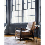 Featuring Chance Warm Taupe Dakota Leather Recliner by Four Hands at Amethyst Home. The Chance Recliner has an invitingly curved seat with dramatic horizontal channels is covered in soft, camel-colored top-grain leather. Rich, tonal frame captures alluring negative—and positive—spaces. A push recliner takes this forward-thinking lounger to the next level.
.  Amethyst Home provides interior design, new home construction design consulting, vintage area rugs, and lighting in the Charlotte metro area.