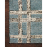 Featuring Carrier & Company x Loloi Milton Ocean / Ivory Rug by Loloi at Amethyst Home. Carrier & Company x Loloi Milton Ocean / Ivory Rug uses a banding detail to express the rich and plush pile. The addition of jute to the wool and cotton rugs creates a luxurious density that can be both seen and felt. As a simple border detail, a graphic plaid, or an o.  Amethyst Home provides interior design, new home construction design consulting, vintage area rugs, and lighting in the Washington metro area.