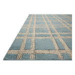 Featuring Carrier & Company x Loloi Milton Ocean / Ivory Rug by Loloi at Amethyst Home. Carrier & Company x Loloi Milton Ocean / Ivory Rug uses a banding detail to express the rich and plush pile. The addition of jute to the wool and cotton rugs creates a luxurious density that can be both seen and felt. As a simple border detail, a graphic plaid, or an over-.  Amethyst Home provides interior design, new home construction design consulting, vintage area rugs, and lighting in the Austin metro area.