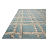 Featuring Carrier & Company x Loloi Milton Ocean / Ivory Rug by Loloi at Amethyst Home. Carrier & Company x Loloi Milton Ocean / Ivory Rug uses a banding detail to express the rich and plush pile. The addition of jute to the wool and cotton rugs creates a luxurious density that can be both seen and felt. As a simple border detail, a graphic plaid, or an over-.  Amethyst Home provides interior design, new home construction design consulting, vintage area rugs, and lighting in the Austin metro area.