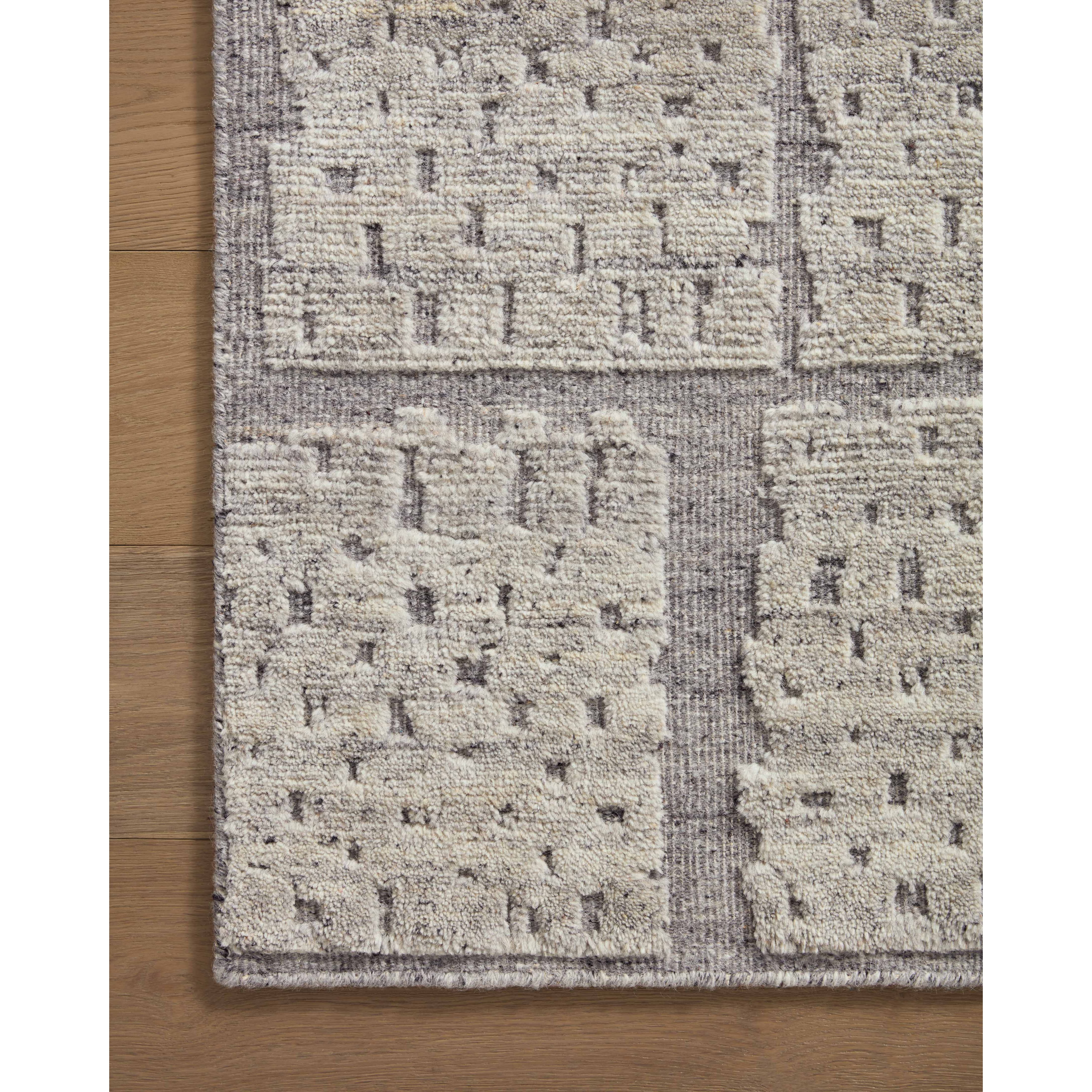 Featuring Carrier & Company x Loloi Moore Grey / Dove Hand-Knotted Rug by Loloi at Amethyst Home. The Moore Collection for Carrier and Company x Loloi is a sophisticated area rug with a subtle interplay of higher, lighter tone pile above a deeper-toned base pile. Abstract geometric patterns in airy, neutral palettes create a sense of freshness and textur.  Amethyst Home provides interior design, new home construction design consulting, vintage area rugs, and lighting in the Kansas City metro area.