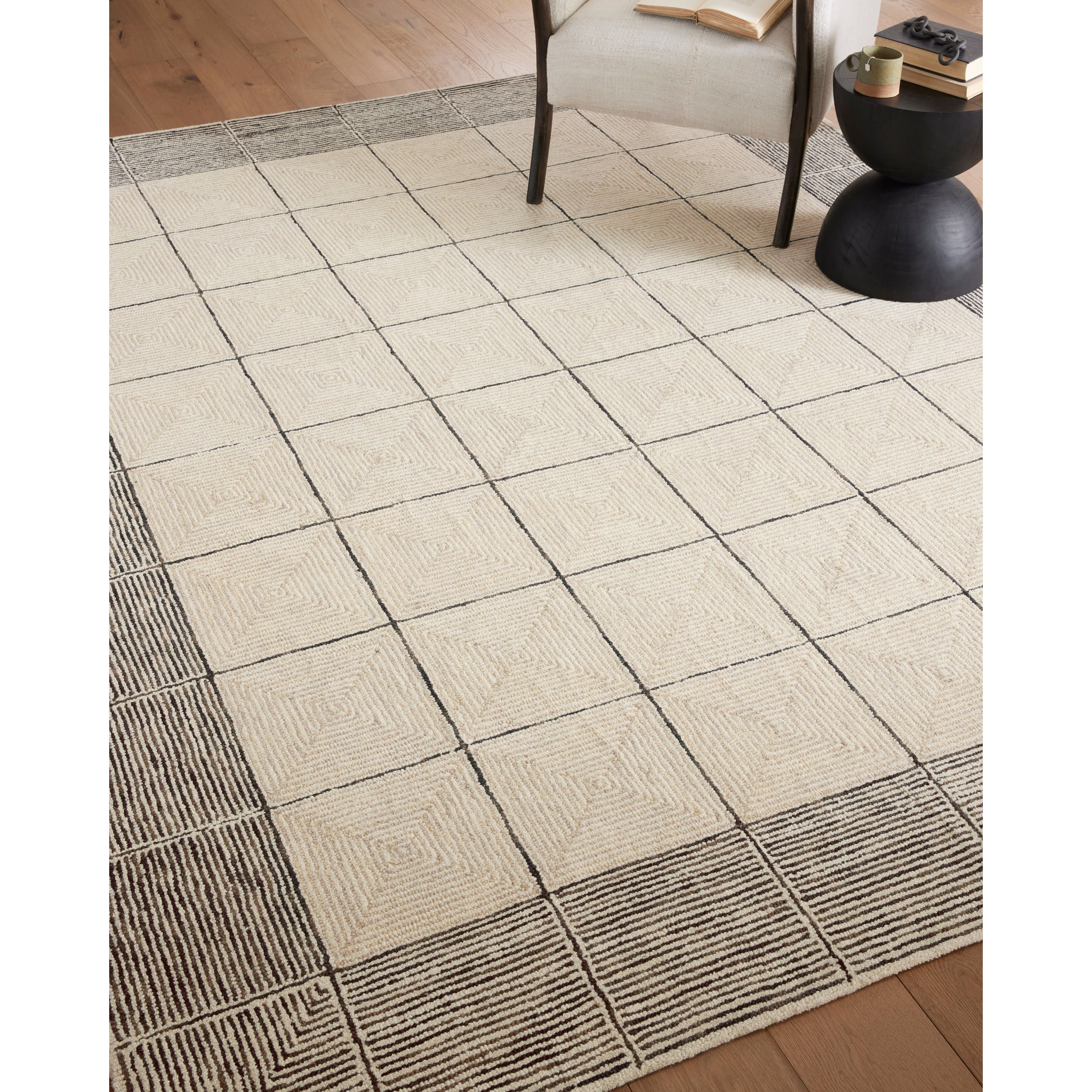 Featuring Chris Loves Julia x Loloi Francis Cream / Black Rug by Loloi at Amethyst Home. The unboring neutral. Picture perfect — we love the way this rug frames your furnishings.
It’s no coincidence that the pattern of the Francis Cream / Black rug for Chris Loves Julia x Loloi may remind you of tilework—it’s based on favorite flooring patterns of the couple, from tilework to parquet fl. Amethyst Home provides interior design services, furniture, rugs, and lighting in the Winter Garden metro area.