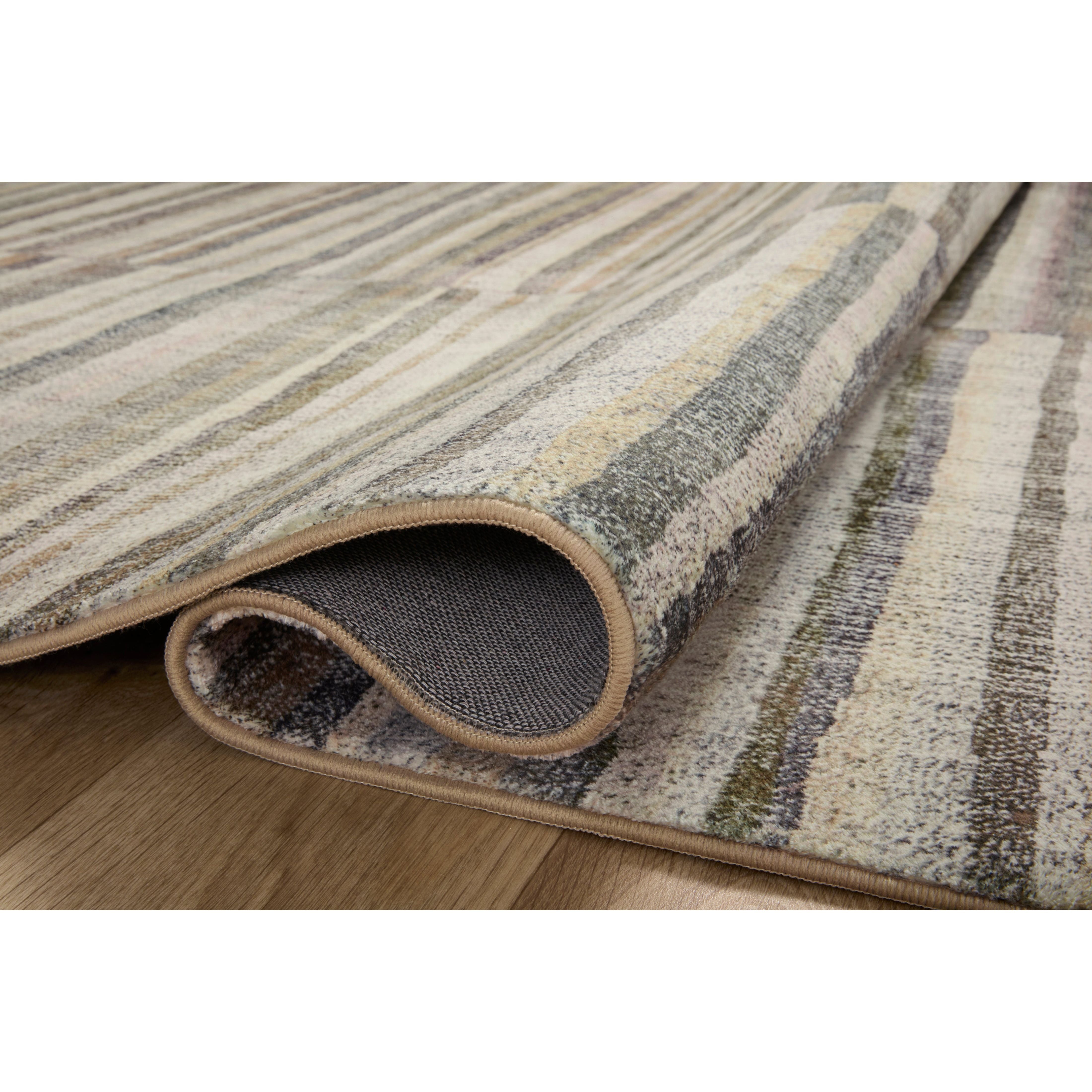 Blending vintage + modern, the Humphrey Natural / Moss rug looks beautiful with dark toned woods, moody walls, and heirloom pieces. Made of a dreamy cloud-pile texture that mimics the soft pile of a sheepskin, it's an Amethyst favorite! Amethyst favorite! Amethyst Home provides interior design services, furniture, rugs, and lighting in the Tampa metro area.