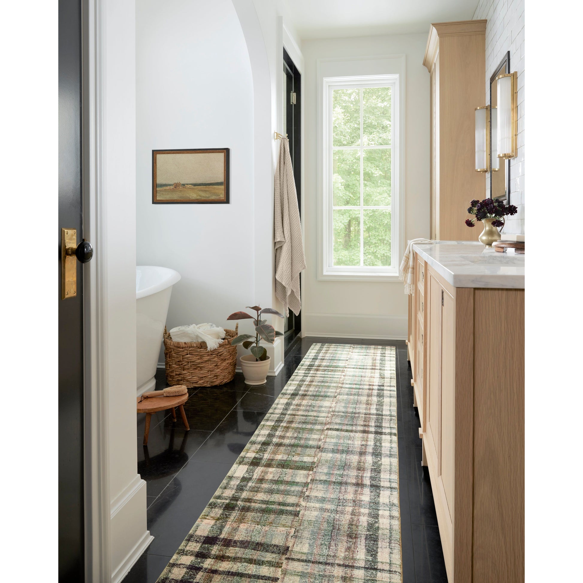 The plaid trend is here and we are ready for it! Blending vintage + modern, the Humphrey Forest / Multi rug looks beautiful with dark toned woods, moody walls, and heirloom pieces. Made of a dreamy cloud-pile texture that mimics the soft pile of a sheepskin, it's an Amethyst favorite! Amethyst favorite! Amethyst Home provides interior design services, furniture, rugs, and lighting in the Charlotte metro area.