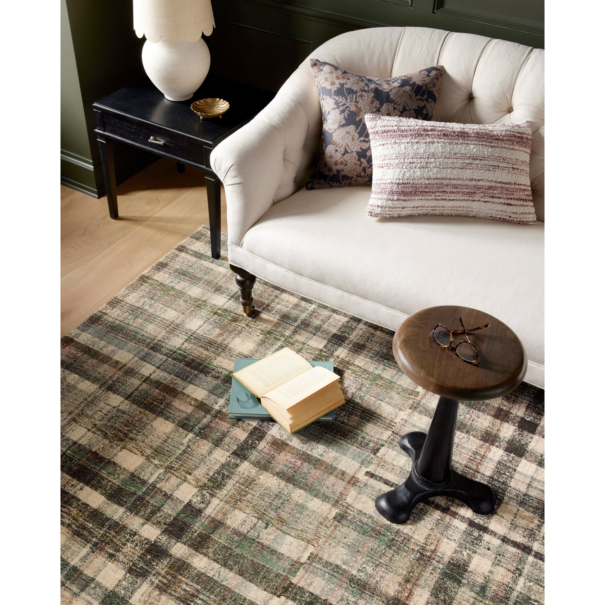 The plaid trend is here and we are ready for it! Blending vintage + modern, the Humphrey Forest / Multi rug looks beautiful with dark toned woods, moody walls, and heirloom pieces. Made of a dreamy cloud-pile texture that mimics the soft pile of a sheepskin, it's an Amethyst favorite! Amethyst favorite! Amethyst Home provides interior design services, furniture, rugs, and lighting in the Houston metro area.