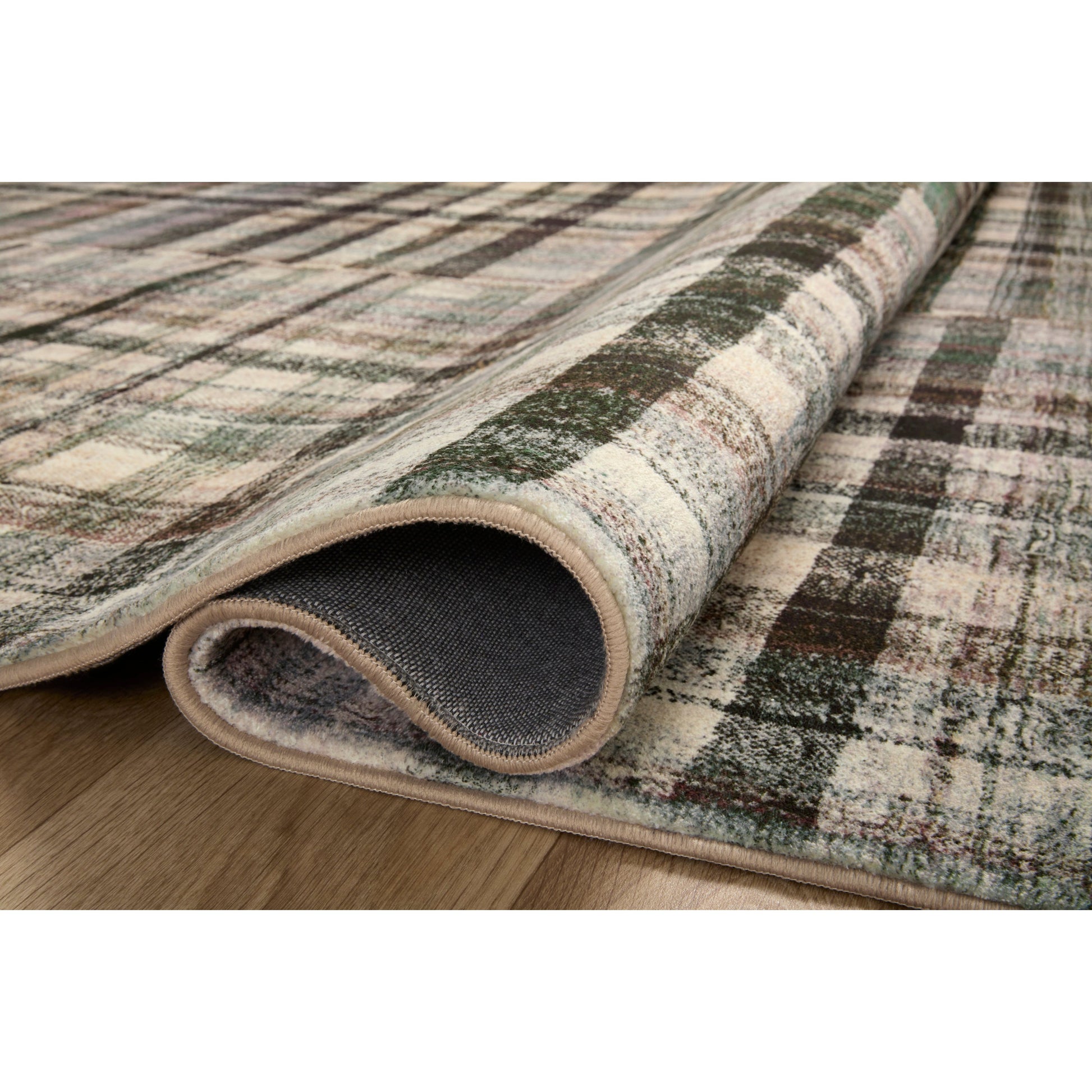 The plaid trend is here and we are ready for it! Blending vintage + modern, the Humphrey Forest / Multi rug looks beautiful with dark toned woods, moody walls, and heirloom pieces. Made of a dreamy cloud-pile texture that mimics the soft pile of a sheepskin, it's an Amethyst favorite! Amethyst favorite! Amethyst Home provides interior design services, furniture, rugs, and lighting in the Omaha metro area.