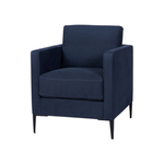 Featuring Benedict Upholstered Chair - Custom by Cisco Brothers at Amethyst Home. The Benedict Chair - Custom by Cisco Brothers is a modern design with clean lines and sleek metal legs in black rust. It has a fresh and functional aesthetic with no-sag support. As a small scale sofa, its ideal for apartment living and suitable for any occasion. Photograph.  Amethyst Home provides interior design, new home construction design consulting, vintage area rugs, and lighting in the Kansas City metro area.