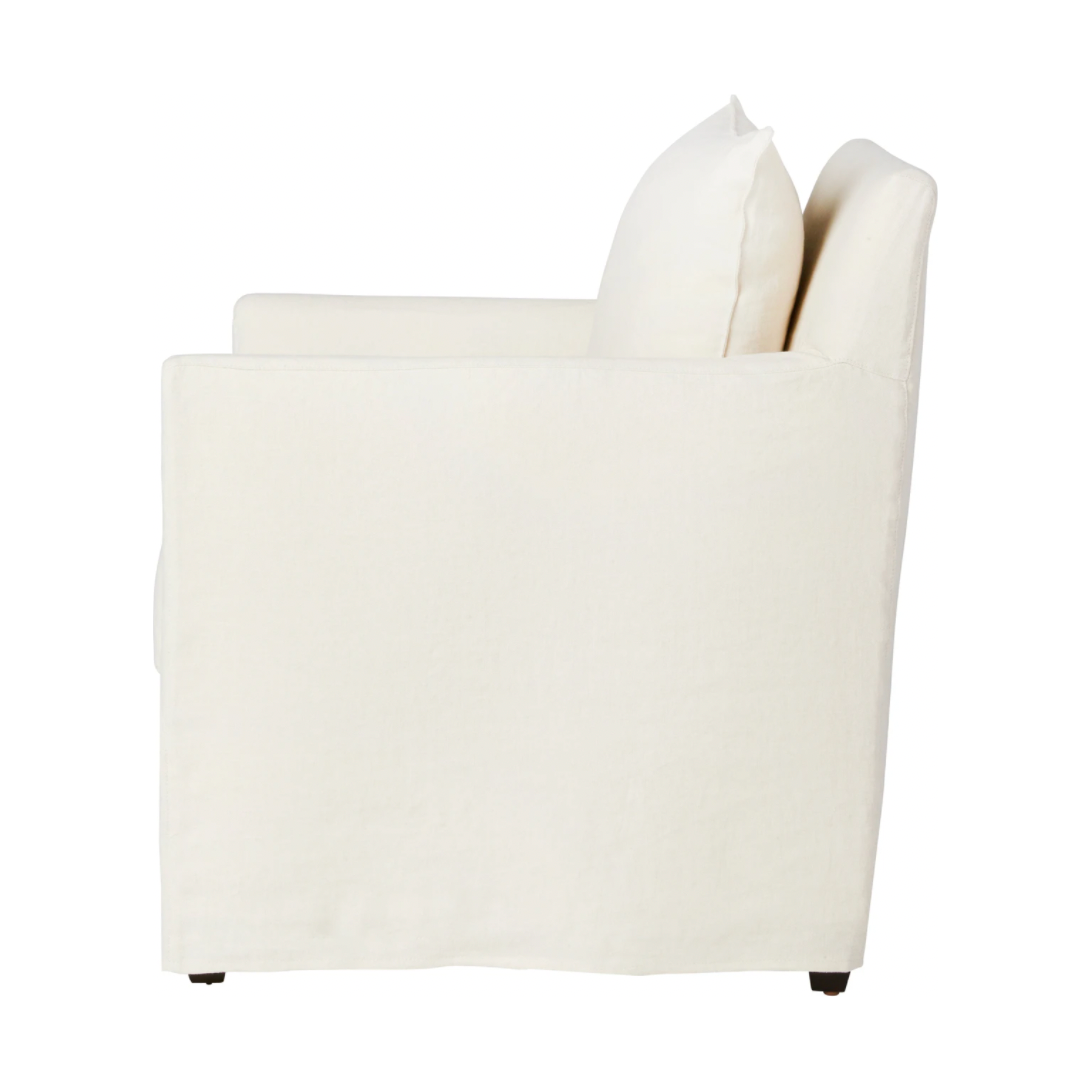 The Elm Chair - Essentials by Cisco Brothers has a clean, smart design with thin arms optimal seating space on a small scale frame. The streamlined silhouette is perfect for adding a fresh touch to any living ensemble. The best spot for entertaining guests or just taking some time for yourself. Photographed in a Mariet Ivory.  Overall: 25"w x 32"d x 35"h