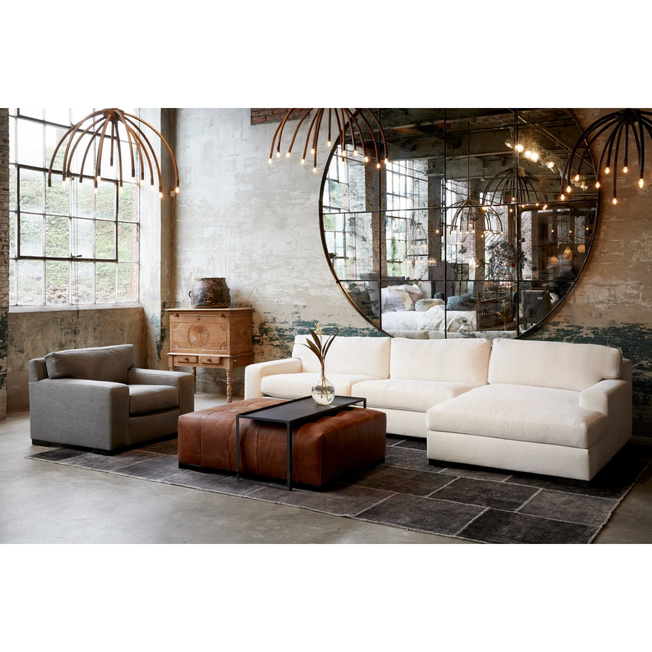 With its streamlined silhouette and strong, angular lines the Loft 2 Piece Sectional - Essentials is classic without being too traditional. It has a modern essence and elegance that lends inviting appeal to your seating ensemble. Dim the lights, and settle down with the family for an entertaining night in. Photographed in Mariet Natural and Logan Grey.   Overall: 138"w x 68"d x 29"h