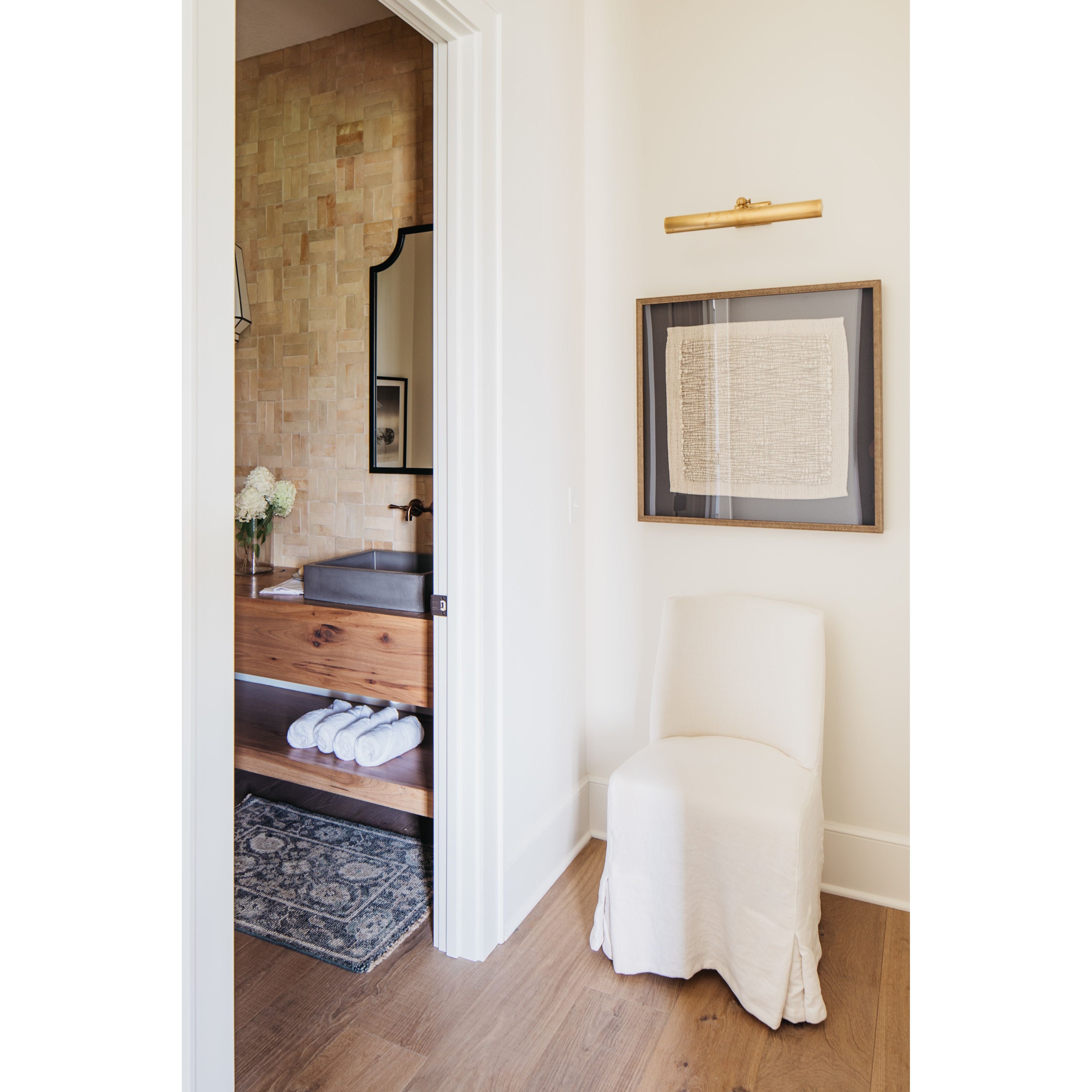 Featuring Craig Dining Chair by Dovetail at Amethyst Home. The Craig Dining Chair is featured in a gorgeous white linen slip cover in a Belgian wrinkle. The chair is comfortable, chic, and easy to care and maintain.

Belgian wrinkle white linen fabric
Birch frame

Size: 19"L x 23"d x 35"hSeat Height: 20"h.  Amethyst Home provides interior design, new home construction design consulting, vintage area rugs, and lighting in the Salt Lake City metro area.