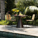 Featuring Florina Indoor/Outdoor Dining Table by Dovetail at Amethyst Home. Upgrade your outdoor dining experience with the Florina Indoor/Outdoor Dining Table. This elegantly designed table provides a sturdy and stylish surface for your meals, making every gathering with friends and family a special occasion.
Overall Dimensions: 41.5 in L x 41.5 in W x . Amethyst Home provides interior design, new home construction design consulting, vintage area rugs, and lighting in the Laguna Beach metro area.
