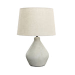 Featuring Kennsie Table Lamp by Dovetail at Amethyst Home. Soft and sculptural -- the Kennsie table lamp is our definition of "serene".
Depth : 16 inHeight : 24 inWidth : 16 in
Finish : Light Grey Finish and White Linen ShadeMaterial : Concrete Resin Base and Linen Shade. Amethyst Home provides interior design, new home construction design consulting, vintage area rugs, and lighting in the Alpharetta metro area.