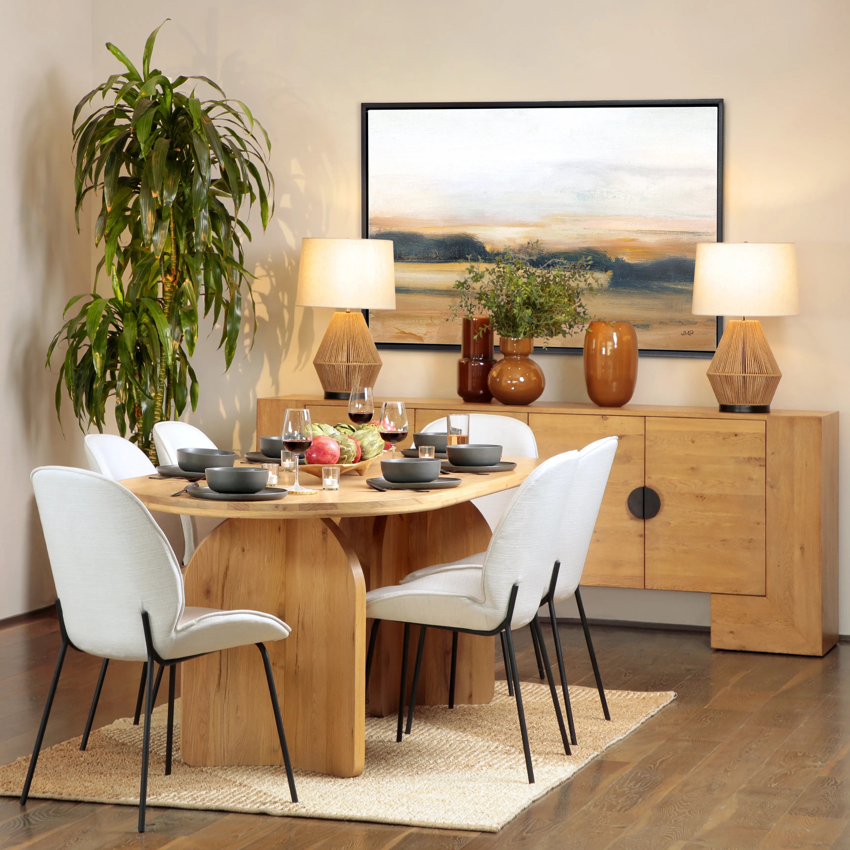 Featuring Navarro Dining Table by Dovetail at Amethyst Home. A modern piece that will serve as the perfect dining table for everyday living. Our Navarro Dining Table features an oval tabletop and a double x-shaped pedestal base that effortlessly combines modern and sculptural design that is admirable from every angle. Crafted with solid oak wood and sealed w. Amethyst Home provides interior design, new home construction design consulting, vintage area rugs, and lighting in the Monterey metro area.