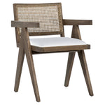 Finished in a grey wash with natural rattan, this beautiful Ocampo dining chair is modern with a tropical flare. The dining chair features a performance linen seat. Amethyst Home provides interior design, new construction, custom furniture, and area rugs in the Kansas City metro area.