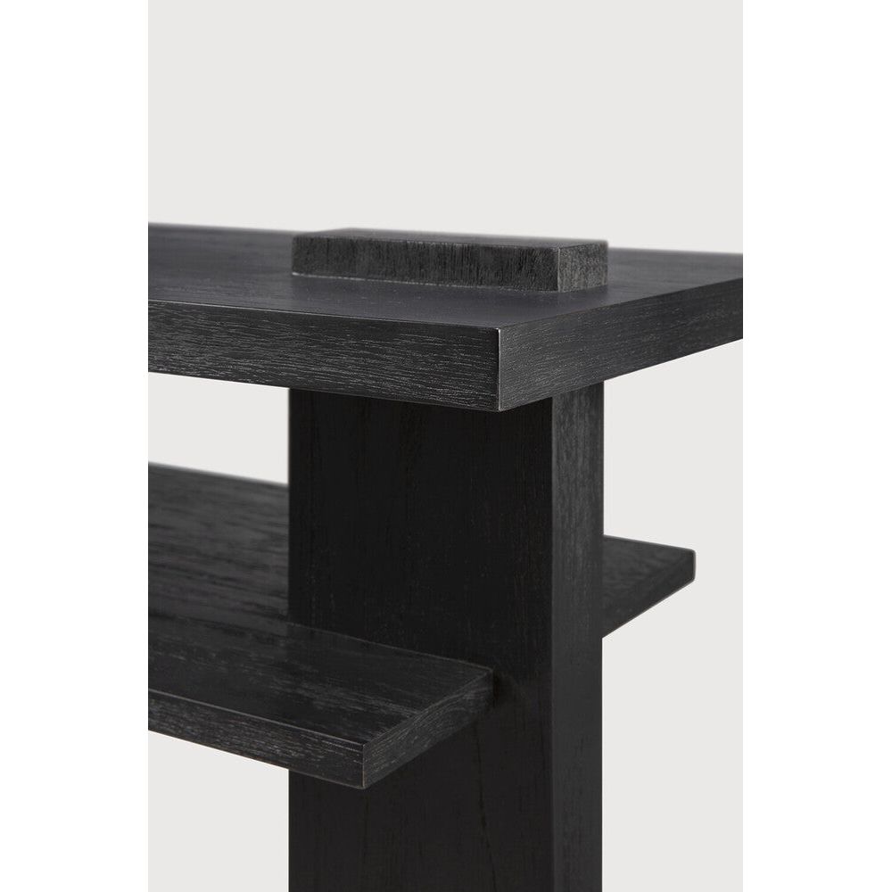 Inspired by the Dutch architectural movement de Stijl, the Abstract console is not only centred around style, but also purpose. With its contemporary black finish, discover new proportions and interest from every angle. Amethyst Home provides interior design, new home construction design consulting, vintage area rugs, and lighting in the Houston metro area.