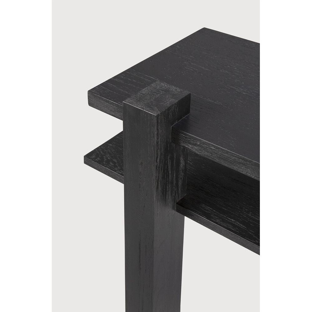 Inspired by the Dutch architectural movement de Stijl, the Abstract console is not only centred around style, but also purpose. With its contemporary black finish, discover new proportions and interest from every angle. Amethyst Home provides interior design, new home construction design consulting, vintage area rugs, and lighting in the Tampa metro area.