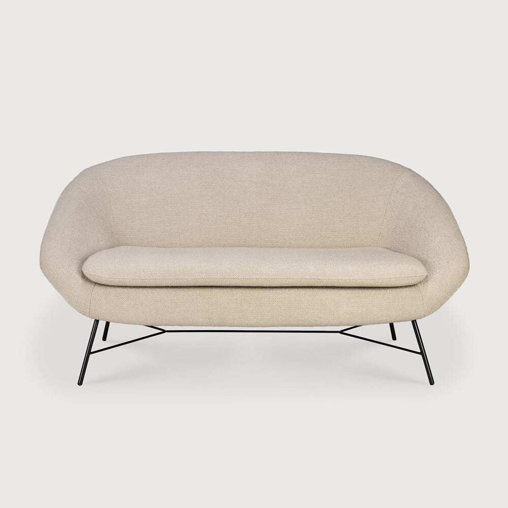 Seeking its inspiration from the 50s, the Barrow sofa has an irresistible vintage vibe. The lightness of the metal foot base teamed with premium upholstery are a timeless addition to any space. Let yourself melt into the warm embrace of this incredibly comfortable sofa. Amethyst Home provides interior design, new home construction design consulting, vintage area rugs, and lighting in the Austin metro area.