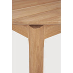 Reminiscent of a goat's curved horns, the Bok collection combines sculptural elegance and contemporary crafting into a graceful and airy form. Just like its matching chair, the Bok dining table is another signature design. Amethyst Home provides interior design, new home construction design consulting, vintage area rugs, and lighting in the Nashville metro area.