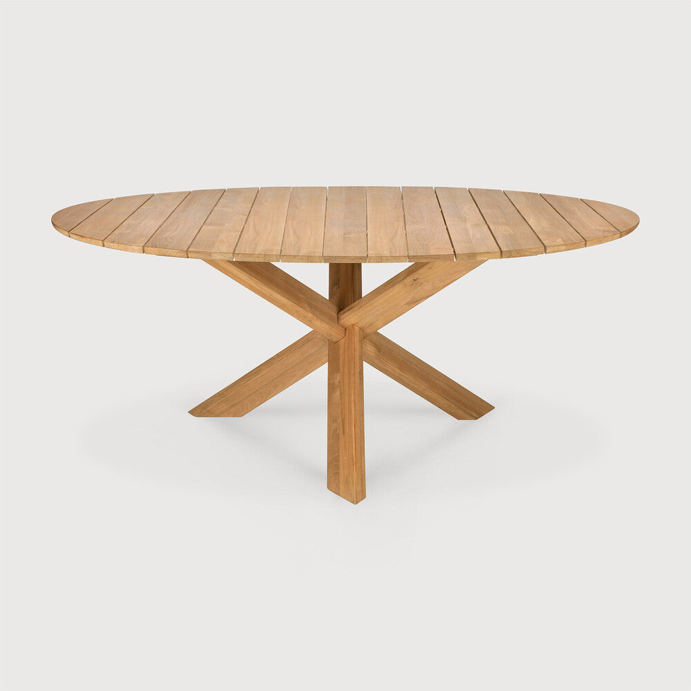 Our Circle dining table is all about inspiring your loved ones to spend a little more time at the table. Its solid legs intertwine in perfect balance, while the adapted grooved design makes outdoor life a simple pleasure. Amethyst Home provides interior design, new home construction design consulting, vintage area rugs, and lighting in the Omaha metro area.