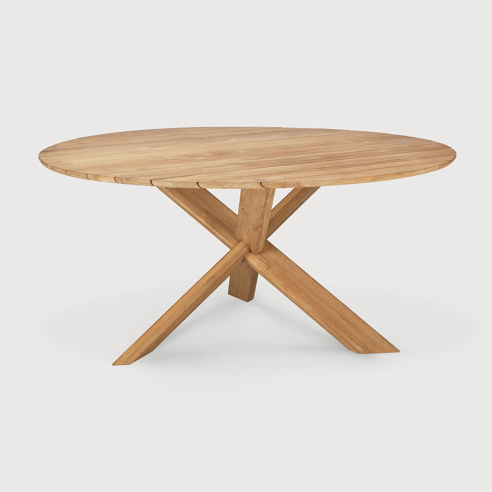 Our Circle dining table is all about inspiring your loved ones to spend a little more time at the table. Its solid legs intertwine in perfect balance, while the adapted grooved design makes outdoor life a simple pleasure. Amethyst Home provides interior design, new home construction design consulting, vintage area rugs, and lighting in the Portland metro area.