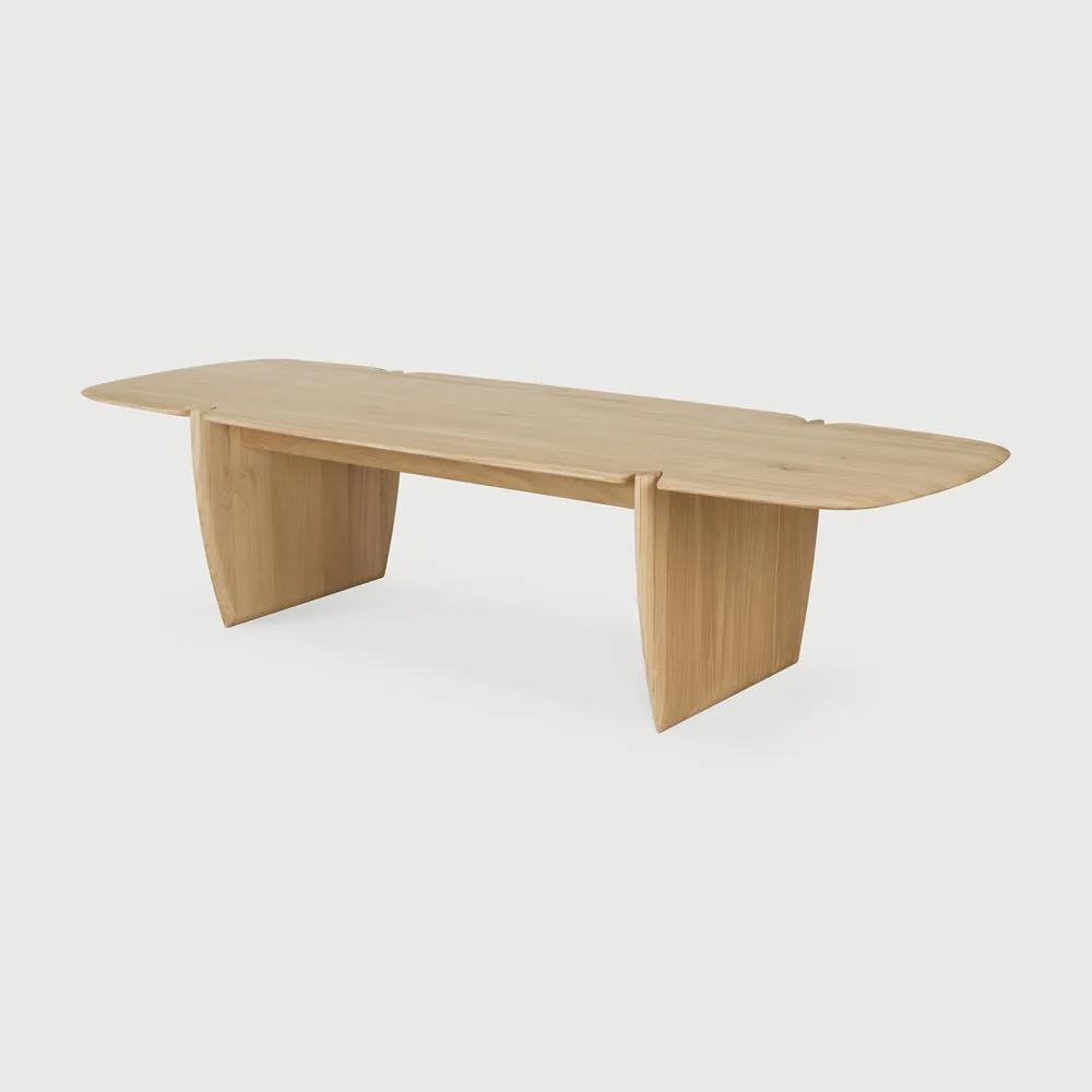Featuring PI Coffee Table by Ethnicraft at Amethyst Home. The PI collection honours nature’s design, by keeping the strength, curves, and lines, as nature intended. Interesting shapes are discovered in this sleek and stylish, polished imperfect, finish. Each PI coffee table is finished by hand to ensure that the individual character of the wood is respected. . Amethyst Home provides interior design, new home construction design consulting, vintage area rugs, and lighting in the Seattle metro area.