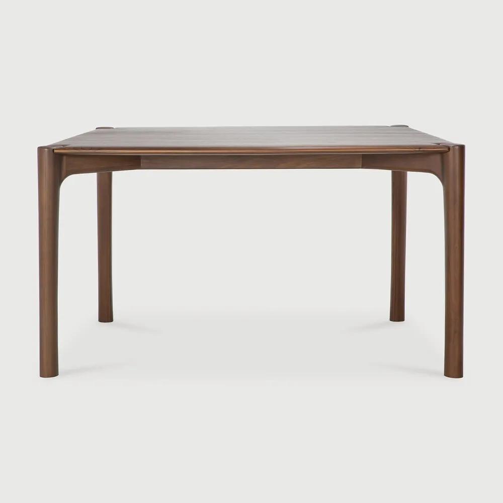 Featuring PI Dining Table by Ethnicraft at Amethyst Home. The PI collection honours nature’s design by keeping the strength, curves and lines, as nature intended. Interesting shapes are discovered in this sleek and stylish, polished imperfect, finish. Each PI dining table is finished by hand to ensure that the individual character of the wood is respected.. Amethyst Home provides interior design, new home construction design consulting, vintage area rugs, and lighting in the Washington metro area.