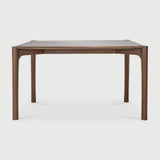 Featuring PI Dining Table by Ethnicraft at Amethyst Home. The PI collection honours nature’s design by keeping the strength, curves and lines, as nature intended. Interesting shapes are discovered in this sleek and stylish, polished imperfect, finish. Each PI dining table is finished by hand to ensure that the individual character of the wood is respected.. Amethyst Home provides interior design, new home construction design consulting, vintage area rugs, and lighting in the Washington metro area.