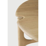 Featuring PI Side Table by Ethnicraft at Amethyst Home. The PI collection honors nature’s design, by keeping the strength, curves, and lines, as nature intended. Interesting shapes are discovered in this sleek and stylish, polished imperfect, finish. Each PI side table is finished by hand to ensure that the individual character of the wood is respected. Desig. Amethyst Home provides interior design, new home construction design consulting, vintage area rugs, and lighting in the Houston metro area.